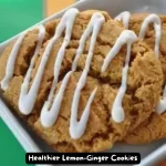 Freshly baked healthier lemon-ginger cookies drizzled with lemon glaze