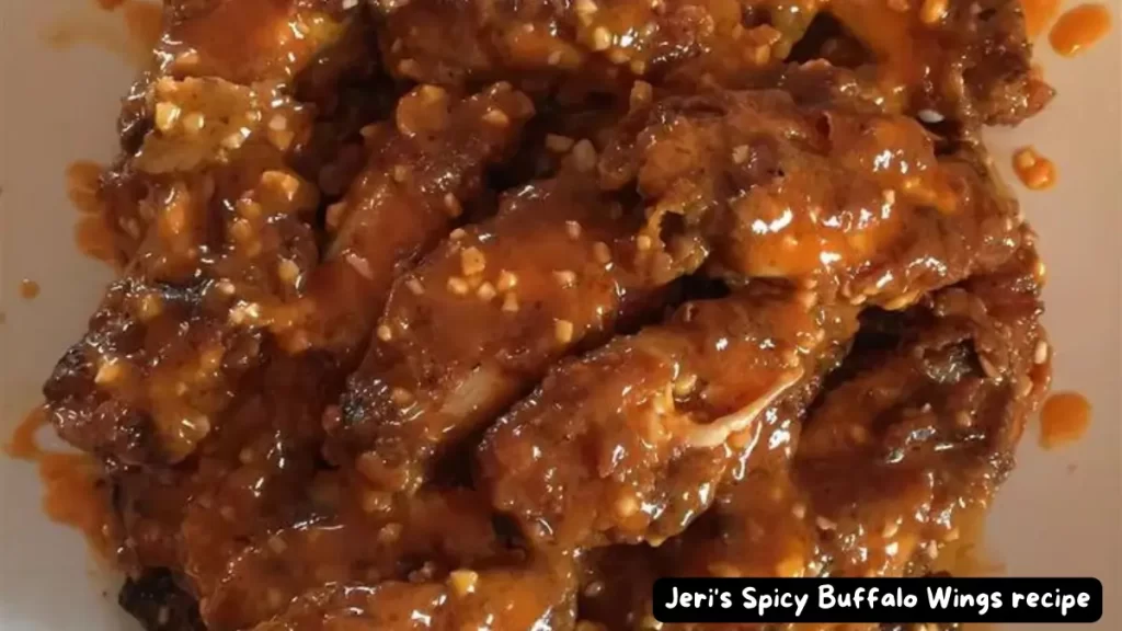 Plate of Jeri's Spicy Buffalo Wings covered in sauce.
