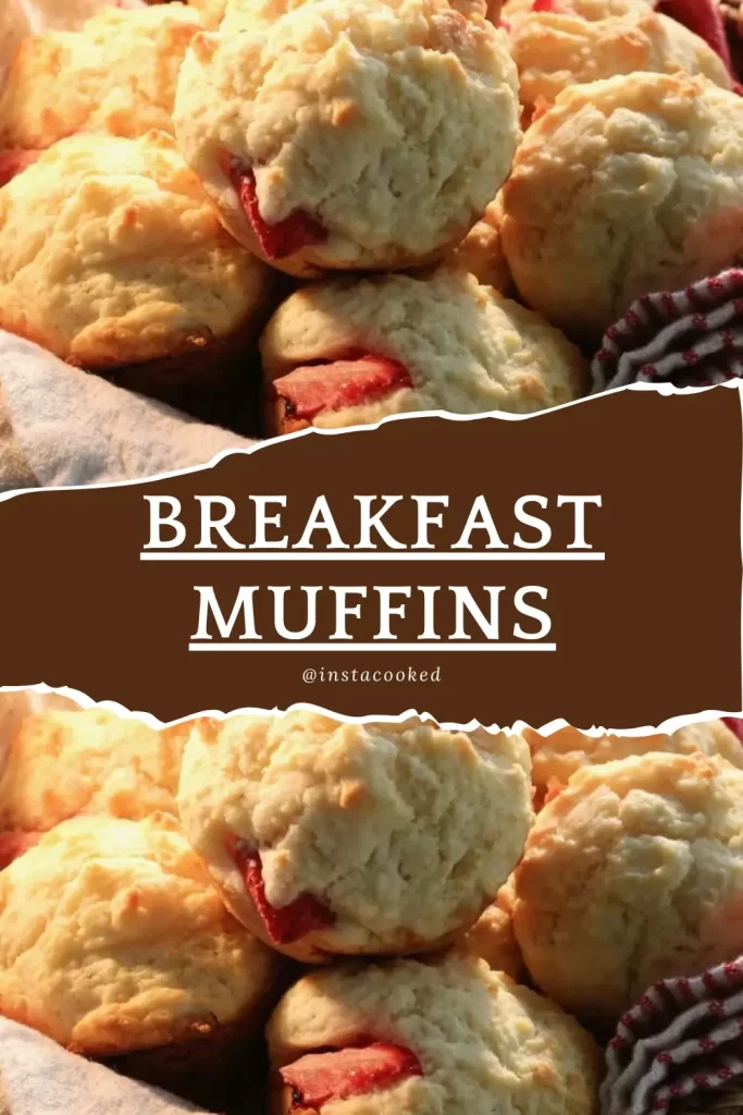 A plate of golden-brown breakfast muffins piled high, showcasing their fluffy texture.