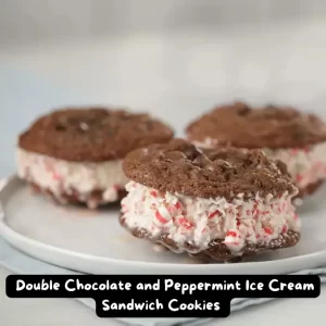 A stack of double chocolate ice cream sandwich cookies rolled in crushed peppermint candies, perfect for holiday desserts.