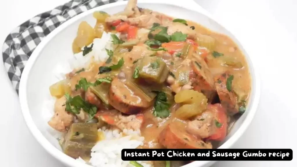 Bowl of Instant Pot Chicken and Sausage Gumbo with rice, garnished with parsley