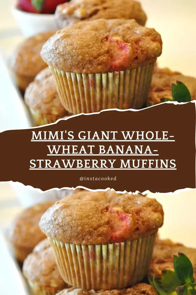 Mimi's Giant Whole Wheat Banana Strawberry Muffins arranged neatly in a baking tray, emphasizing their golden-brown crust and delightful fruit filling.