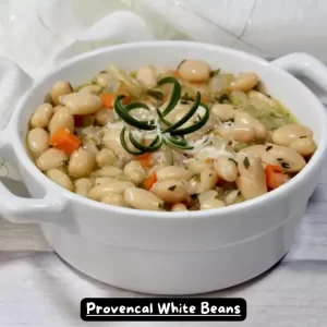 Bowl of Provencal White Beans garnished with parsley and Parmesan