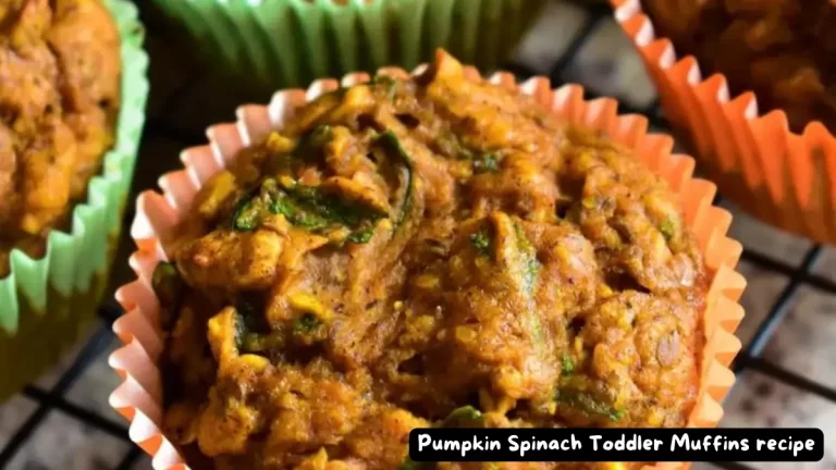 Freshly baked Pumpkin Spinach Toddler Muffins in colorful cupcake liners, highlighting their rich and healthy ingredients.