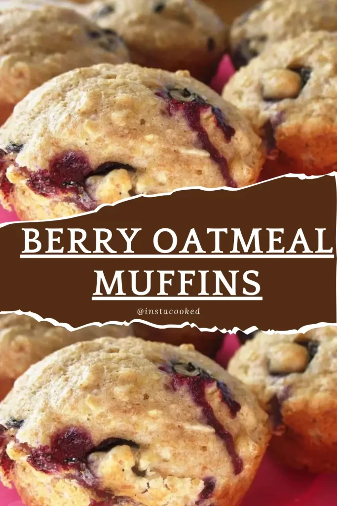 A close-up of a single berry oatmeal muffin, highlighting the deliciously moist interior with visible berry pieces and a golden exterior.