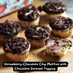 Freshly baked Strawberry-Chocolate Chip Muffins with a Chocolate Streusel Topping