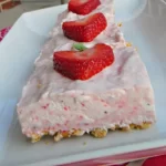 Strawberry Margarita Squares topped with fresh strawberries, served on a pretzel crust